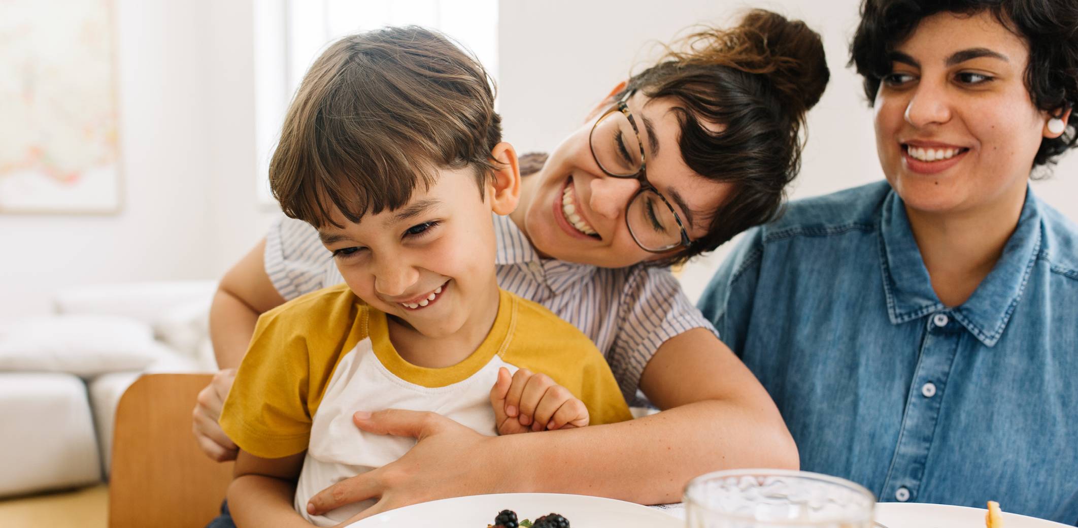 family-having-fun-at-breakfast