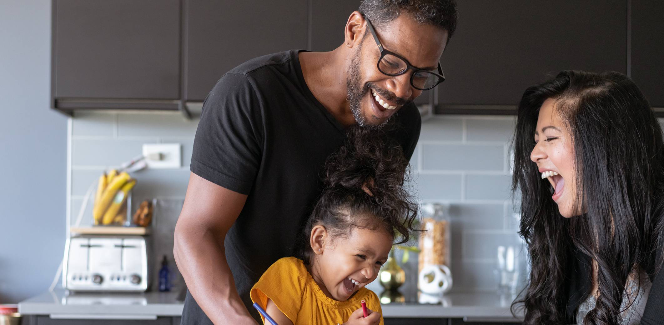 mixed-race-couple-bonding-with-daughter
