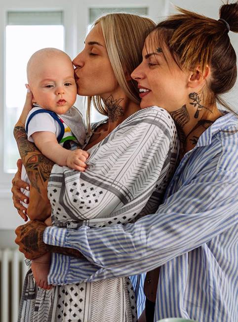 young-lgbt-couple-with-baby