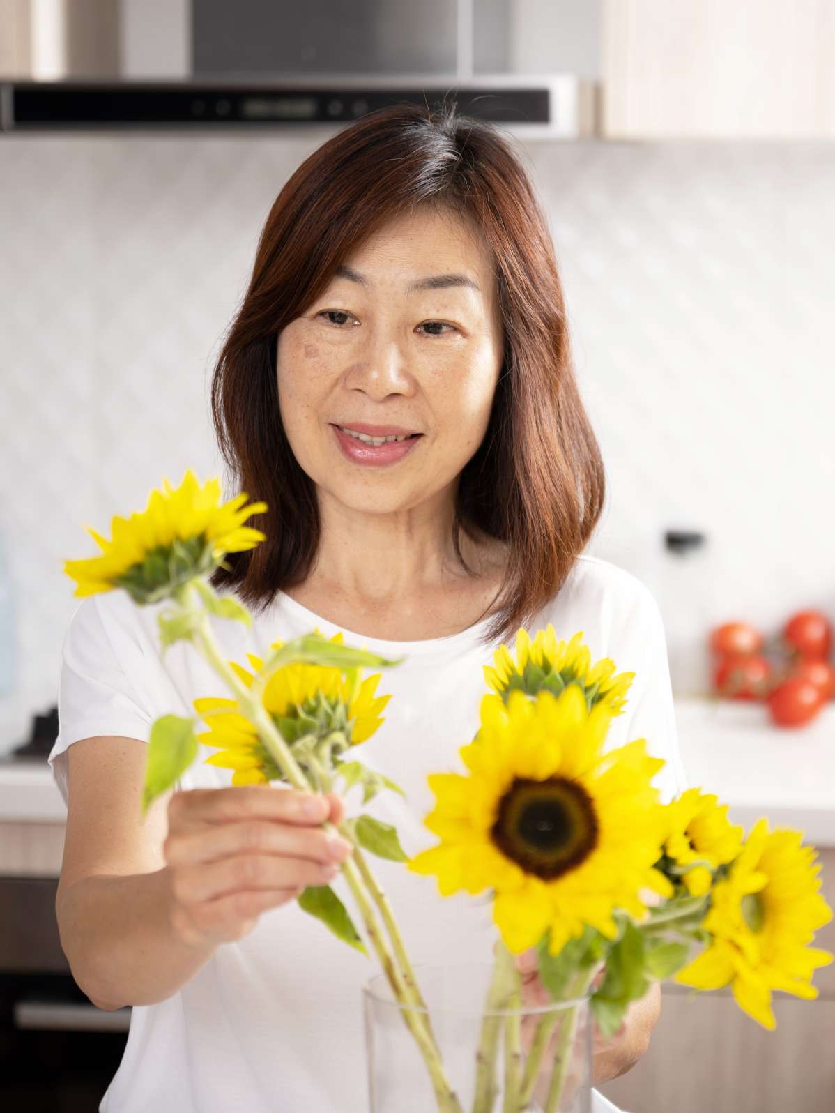 senior-asian-woman-sunflower